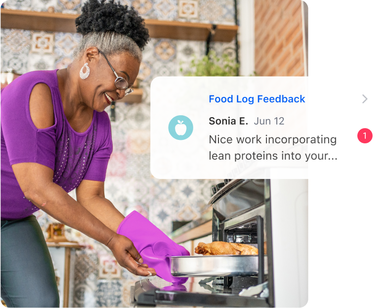 Graphic showing an elderly woman in a purple shirt putting food into her oven, with an overlay of the Teladoc Health app's Food Log feedback message.