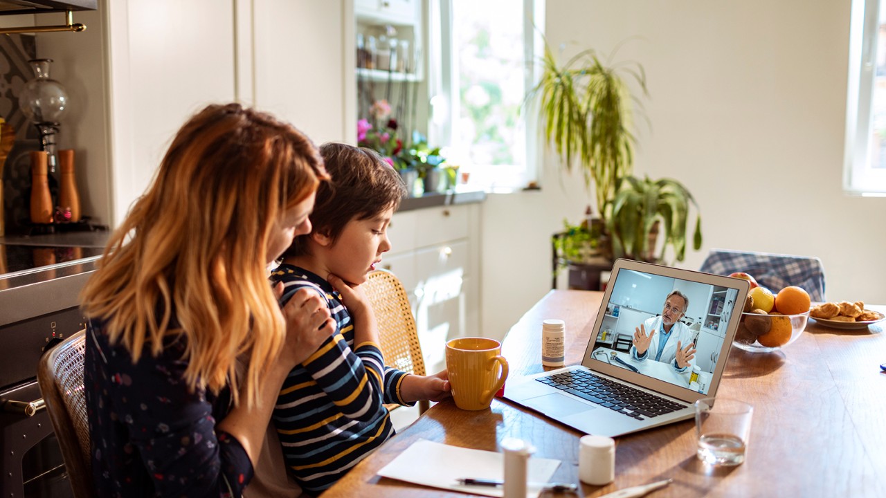 Woman and her son on a virtual visit call