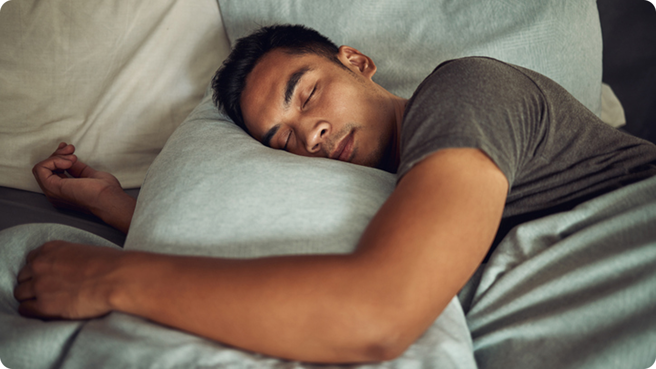 Man in bed sleeping